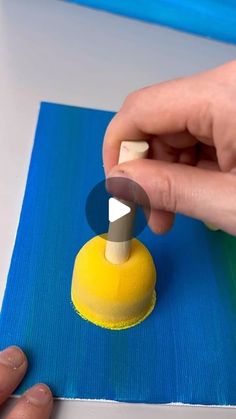 someone is using a sponge to make something