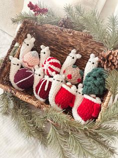 knitted christmas stocking ornaments in a basket