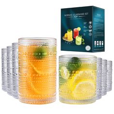 a set of six glasses filled with fruit