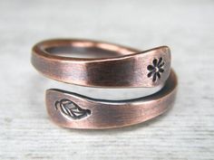 Nature Copper Ring, Flower & Leaf Stamped Copper Wire Ring. Stamped with flower print on one side and Leaf on the other. Made from 10 gauge copper wire, it is filed, hammered, stamped, antiqued and hand polished. This ring is simple yet contemporary and very comfortable. This Copper Ring is made of Copper Wire Ring, Stamping Jewelry, Paw Print Ring, Paw Jewelry, Paw Ring, Hand Stamped Ring, Pet Jewelry, Copper Jewellery, Pet Memorial Jewelry