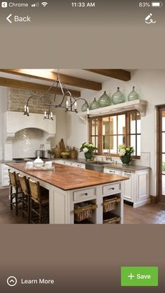 the kitchen is clean and ready to be used for cooking or baking, with an island in the middle