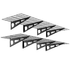 three black metal shelves with holes in them