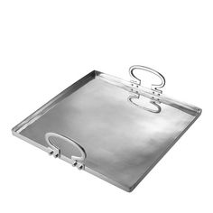 an empty metal tray with handles on it