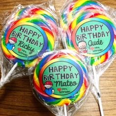 three lollipops with the words happy birthday on them