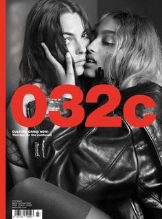 two women kissing each other in front of a red background with the words 002c