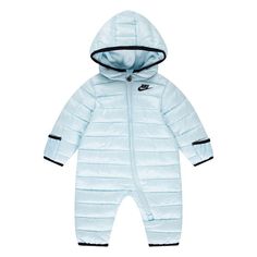 Perfect for chilly winter weather, your little newborn baby will be warm and cozy in this Nike water resistant midweight puffer snowsuit. Click on the BABY PRODUCTS & CLOTHES GUIDE to find everything you need to keep your baby healthy and happy!FEATURES Midweight Water resistant Cozy hood Long sleeves Zipper front closure Elastic cuffs Hands and feet warmers Arctic fleece lining Futura logo on the chest Gender neutralFABRIC & CARE Polyester Machine wash Imported Size: 6 Months. Color: Glacier Bl Blue Puffer Jacket With Adjustable Hood For Outdoor Activities, Blue Puffer Jacket With Adjustable Hood For Outdoor, Infant Snowsuit, Toddler Winter Coat Boy, Baby Patagonia Snowsuit, Baby Nike, Winter Weather, Outerwear Vest, Snow Suit