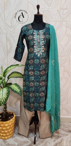 Material: Muslin Silk. Top Length: 47 inches. Pant: 39 inches. Check our size chart for size reference. Fitted Green Chinon Sets, Elegant Semi-stitched Cotton Dress, Elegant Green Sharara With Traditional Drape, Elegant Green Sharara For Diwali, Elegant Multicolor Art Silk Sharara, Elegant Green Festive Sharara, Elegant Cotton Dress For Festivals, Elegant Silk Anarkali Set With Floral Print, Elegant Semi-stitched Green Sharara