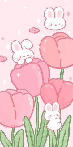 some pink flowers are in the grass and one bunny is sitting on top of it