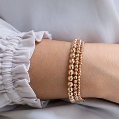 Timeless and effortless our gold bead bracelets are great every day stacking bracelets. What sets us apart? Our 3mm bead bracelets are made with 14k solid gold,  through and through!  All elements used are 14k solid gold. Starting with our durable 3mm beads,  a 14k gold rolo chain that the beads are mounted on , 14k gold clasp, and jump ring. Our bracelets are also hallmarked with 585 (14k solid gold) and our registered VFD Jewelers stamp. Details: ✦ 14k solid gold Disco (facetted mirror)  beads Gold Ball Bracelet, Gold Beaded Bracelet, Bracelet Stacking, Everyday Bracelet, Gold Armband, Ball Bracelet, Gold Bead Bracelets, Bead Bracelets, Rolo Chain