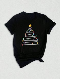 Introducing our adorable Christmas Tree Tee, the perfect addition to your holiday wardrobe! ❄️ Our Christmas Shirt is specifically designed for the festive season, with a delightful Christmas Tree prominently displayed on the front.  This unique design combines the enchantment of Christmas with a touch of winter charm, making it an ideal choice for those seeking a Cute Christmas Shirt to spread joy and merriment during the holiday season.  Crafted for comfort and style, our Christmas Woman Tee is made from high-quality materials, ensuring a soft and smooth feel against your skin. Whether you're attending a Christmas party, staying cozy at home, or simply embracing the spirit of the season, this Light Tree Shirt is a must-have for all Christmas enthusiasts.Christmas Light Tree Shirt, Cute C Christmas Light Tree, Womens Corset Tops, Light Tree, Plant Texture, Cozy At Home, Cute Christmas Shirt, Halloween Letters, Cute Christmas Shirts, All Christmas