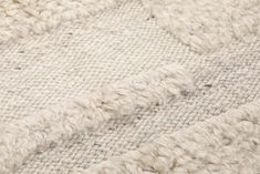 closeup of the texture of a white rug