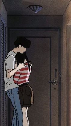 an image of a man and woman kissing in the hallway