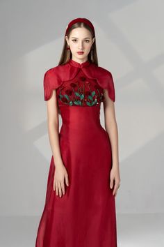 Indulge in luxury with our Ao Dai. Made with the finest silk organza, this sheath design features delicate flower appliques that flow down the full length of the garment, creating a stunning and elegant look. Elevate your style with this exclusive piece. Length: Top: 150cm, Pants: 110cm Silk Material Dress Styles, Organza Mini Dress, Myanmar Clothes, Des Roses, Waist Beads, A Line Shorts