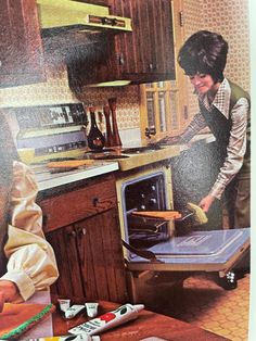 an old photo of a woman in the kitchen with her oven open and cleaning supplies on the counter