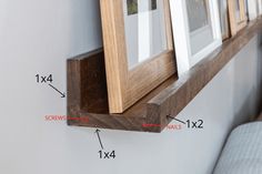 a wooden shelf with pictures on it and measurements for the top half of the frame