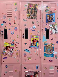 two pink lockers covered in stickers and magnets with pictures on the doors