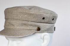 Handmade linen summer caps sewn using old technology without synthetic fabrics inside of the cap. Due to this, the linen cap is breathable and perfect for hot summer days Classic model of newsboy cap is unisex, so it will fit on both men and women. 100% linen, not dyed. 100 % cotton lining. Plastic is used for the brim of the cap, so you can wash it as much as you need. Eyelets - stainless steel SIZE: please coose from drop down menu US Size - 7 1/8, could be reduced to 7, (57-56cm) US Size - 7 Linen Flat Cap For Summer, Summer Linen Flat Cap, Adjustable Linen Cap, White Scrunchie, Blue Scrunchie, Wrist Accessories, Old Technology, Summer Cap, Linen Summer