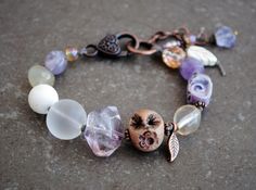 Leaf Boho Bracelet, Artisan Ceramic bracelet, Beaded bracelet, Bohemian jewelry, clay Boho bracelet  Amethyst, Crystal bracelet OOAK About 19cm *Artisan ceramic birds by LonelySeagull  *Quartz *Copper *waxed linen *seed beads *Czech glass beads For more Bohemian jewelry, please visit my shop :) https://www.etsy.com/shop/IsadorasDream Wire Beading, Amethyst Crystal Bracelet, Pink Pearl Bracelet, Ceramic Bracelet, Fluorite Bracelet, Organic Earrings, Fantasy Earrings, Jewelry Clay, Sea Glass Bracelet