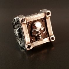 Fenris Skull Tomb Ring Silver Silver biker rocker style skull ring with gothic architectural details, black crystals.Metal: Silver alloySize: 10 Includes velvet gift bag. Need a gift box? We have those too! Mens Skull Rings, Silver Skull Ring, Rocker Style, Architectural Details, Skull Ring, Black Crystals, Ring Silver, Gift Bag, Rocker