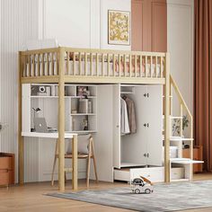 a loft bed with a desk underneath it in a room that has wood floors and white walls