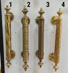 four different types of brass door handles and knobs