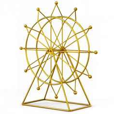 a golden ferris wheel on a white background