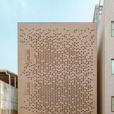 a building with holes on the side of it