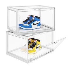 two clear acrylic boxes with shoes in them on the bottom one is yellow and the other is blue