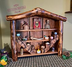 a wooden shelf with various items on it