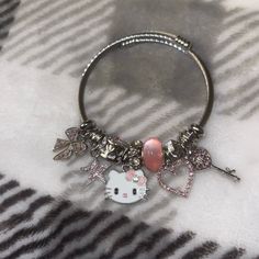 Gorgeous Hello Kitty Bangle Bracelet Charms On Bracelet: Bow, Star , Hello Kitty , Heart And A Key. In Between Each Charm Is A Different Type Of Bead The Bangle Fits To Your Liking As Well. Stretches Open To Your Size :) Brand New Open Bangle Bracelet, Locket Bracelet, Open Bangle, Pandora Style, Silver Charm Bracelet, Band Bracelet, Bangle Bracelets With Charms, Steel Jewelry, Blue Bracelet