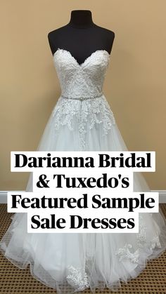 a white wedding dress on a mannequin