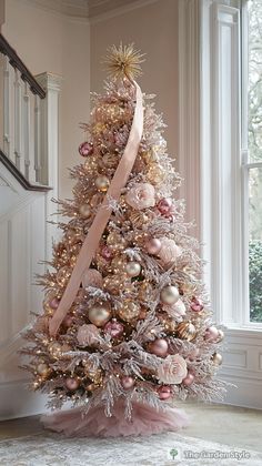 Elevate your tree decor with pink and champagne baubles, part of 35 inspiring pink Christmas decorations that bring a luxurious touch to your holiday decor! The combination of soft pink and champagne creates an elegant pink Christmas aesthetic that pairs beautifully with pink Christmas tree decorations. Click now to add this glamorous look to your tree and explore more festive decor ideas! Pink And Champagne Christmas Decor, Pink And Champagne Christmas Tree, Champagne Christmas Decor, Themed Christmas Tree Ideas, Christmas Decorations Pink, Pink Tree Christmas, Solo Apartment, Tree Decorating Tips, Glamorous Christmas Tree