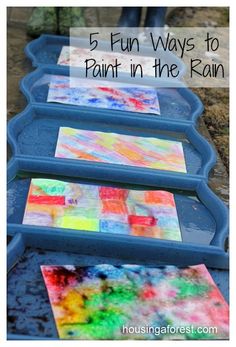 four blue trays with different colored paintings on them and the words, 5 fun ways to paint in the rain