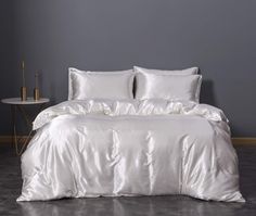 PRICES MAY VARY. Luxury Satin and Silky Duvet Cover Set - You will get 1 x satin king duvet cover (104 inchx90 inch) + 2 x satin pillowcases (20 inchx36 inch) ; hidden zipper closure and 8 interior corner ties keep the comforter in place. Please pay attention -COMFORTER IS NOT INCLUDED! Premium Fabric- Bedcolor satin duvet cover set is made from super-soft, smooth and shiny fabric. As soft as real silk, you will love its luxury, romantic, sophisticated appearance. This satin is so silky and soft Silk Duvet Cover, Cama King Size, Queen Size Comforter, Lit King Size, Silk Bedding Set, King Size Bedding Sets, Luxury Bedding Set, Designer Bedding Sets, Twin Bed Sets