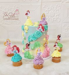 there are many cupcakes that have been decorated with disney princesses on them