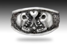 "\"Love\" Skull Ring Custom made to order. Hand carved in wax then cast in solid sterling silver. A fairly small ring - smaller than a dime....at its widest point Lots of detail. Very organic. Highly polished and antiqued for a vintage look. Diamonds or other jewels may be added to the eyes at additional cost. Please inquire. Custom orders welcome." Rocker Rings, Pirate Ring, Memento Mori Ring, Skull Wedding Ring, Sterling Silver Skull Rings, Diamond Skull, Skull Wedding, Silver Skull Ring, Skull Jewelry