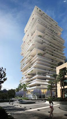 an artist's rendering of a tall building with balconies on the top