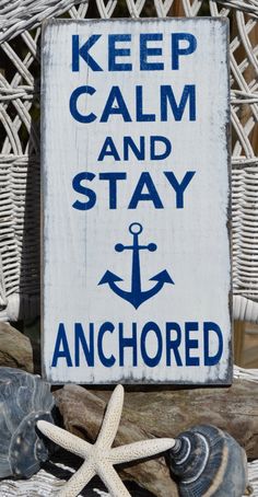 a sign that says keep calm and stay anchored