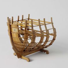 a wooden boat made out of wood sticks