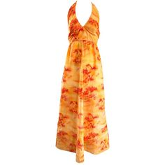 Incredible 1970s Asian themed novelty boho maxi dress! Features a vibrant bright orange, with prints in a brighter orange and red orange throughout. Ties at back top neck with zipper up the skirt. Great with sandals, flats or wedges for day and heels for evening. In great condition. Approximately Size Small - Small Medium Measurements: (slight stretch) 34-36 inch bust 26-27 inch waist Free hips 60 inches from top back halter to hem Orange Clothes Aesthetic, One Piece Drawing Ideas, Retro Dress 70s, Boho Core, Sun Fairy, 1970s Clothes, 1970s Costume, Orange Clothes, 1920s Evening Dress