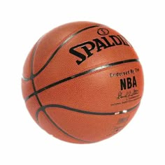 an orange basketball with the word spalding on it is in front of a white background