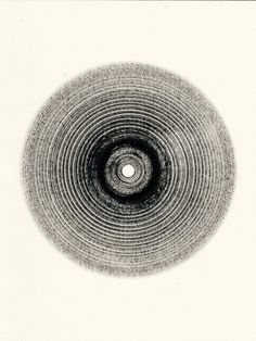 a black and white drawing of a circular object