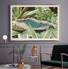 a living room filled with furniture and a painting hanging on the wall over a pool