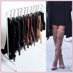 a woman standing next to a rack with over the knee boots