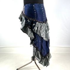 Luna Steampunk Over Skirt, Bustle skirt, tribal mini skirt, fashioned from vintage silk brocade.  This tail skirt is a great addition to all sorts of outfits.  Easily add an extra, colourful layer over leggings, tights, skirts or shorts. Wear at the back or side. The skirt is adjustable in fitting. It has 2 silk ties which are attached to two strong brass hoops for added style and functionality. Strong stitching, pleating and layers of ruched fabric on the tail makes this an eternally stunning p Steampunk Tiered Skirt For Cosplay, Fitted Punk Style Skirt For Costume Party, Steampunk Halloween Costume Skirt, Bohemian Skirt For Cosplay, Gothic Asymmetrical Skirt For Festivals, Gothic Mini Skirt For Alternative Fashion, Alternative Fitted Party Skirt, Alternative Style Fitted Party Skirt, Steampunk Costume Skirt With Attached Cancan