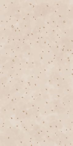 an abstract beige background with tiny stars