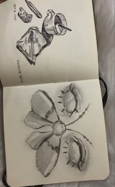 two drawings of flowers are shown on top of each other