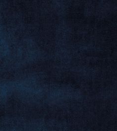 a dark blue area rug that is very soft