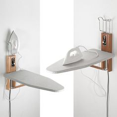 an ironing board is plugged into the wall