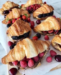 croissants filled with berries and other pastries